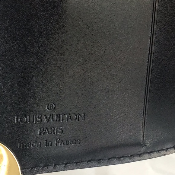 Louis Vuitton black leather bi-fold - Picture 9 of 10